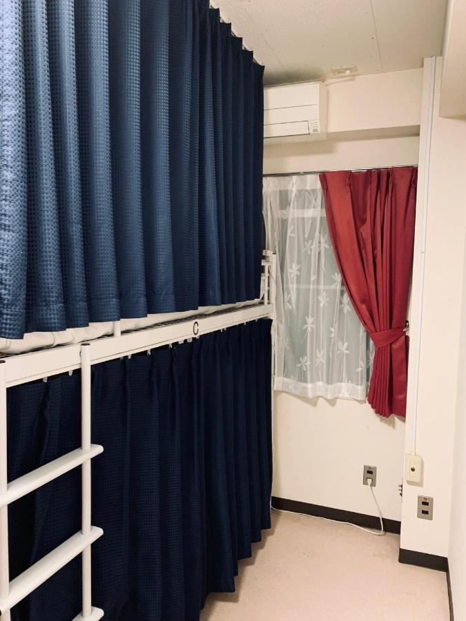 Guesthouse Shiawase Eki Fukuoka  Exteriör bild
